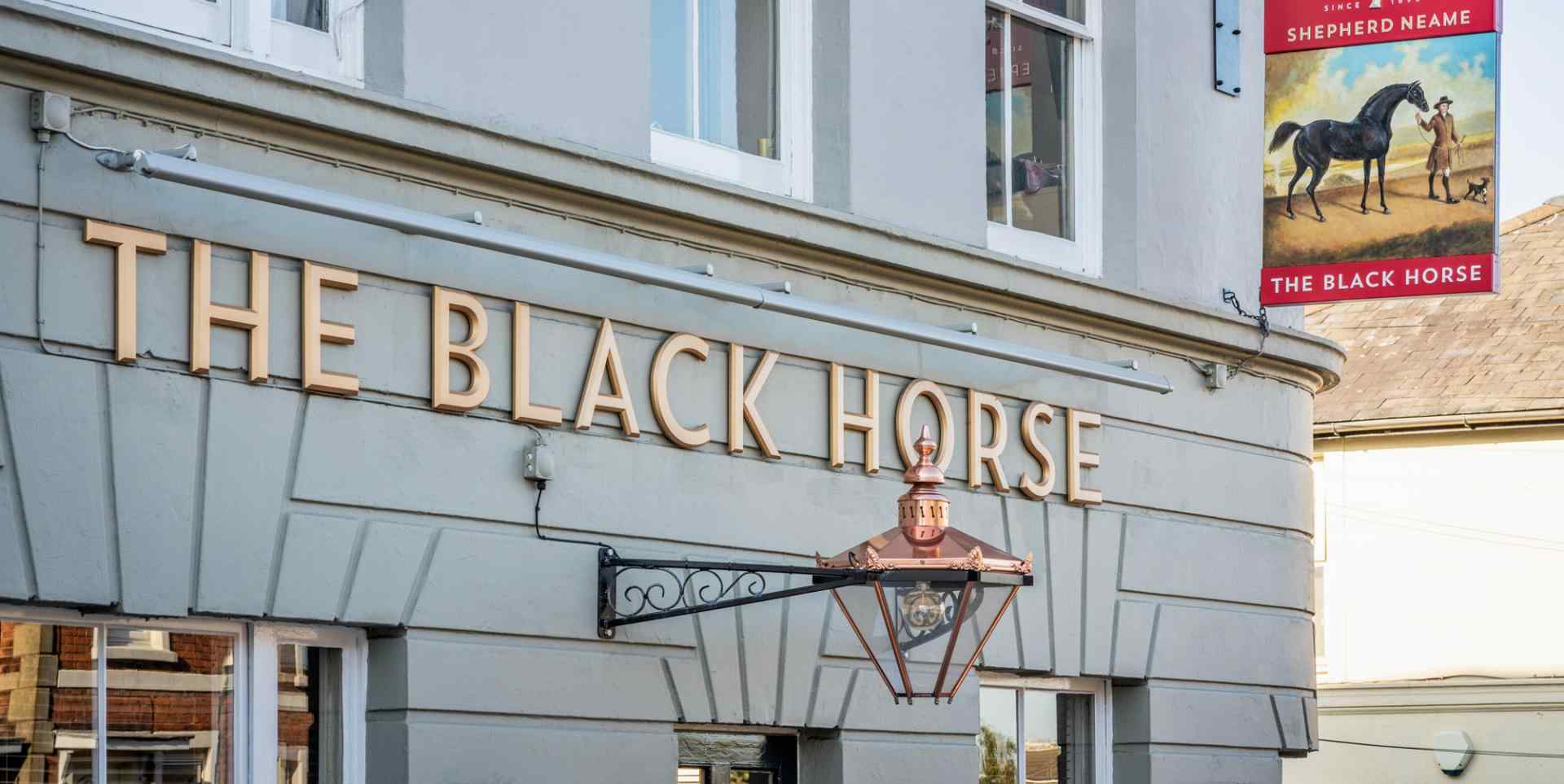 THE BLACK HORSE logo