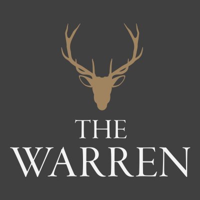 THE WARREN logo